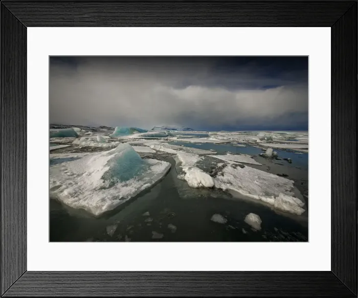 Framed Print : Jokulsarlon lagoon in winter with floating ice bergs after a storm Framed Print : Jokulsarlon lagoon in winter with floating ice bergs after a storm