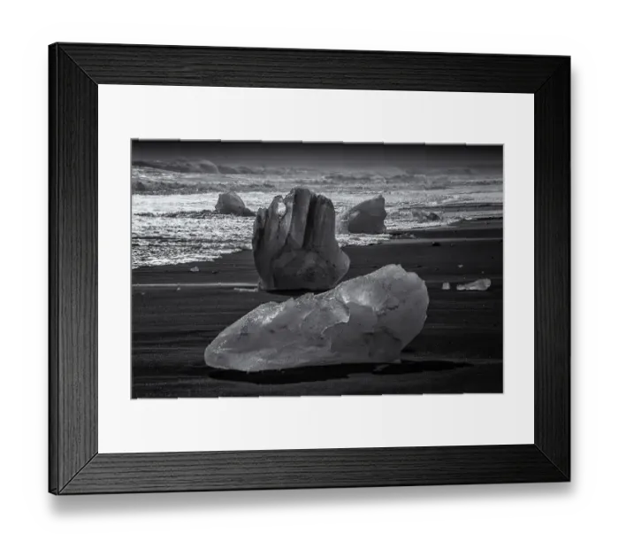 Framed Print : Jokulsarlon Beach in winter, just after a huge storm hit the coastline. Ice bergs from the nearby lagoon have been swept up onto the coastline and surge in and out with the tide Framed Print : Jokulsarlon Beach in winter, just after a huge storm hit the coastline. Ice bergs from the nearby lagoon have been swept up onto the coastline and surge in and out with the tide