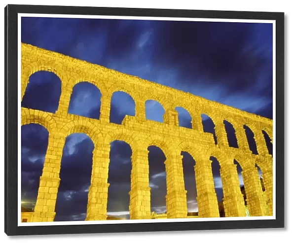 Spain, Castilla y Leon, Segovia, Roman aqueduct, low angle view