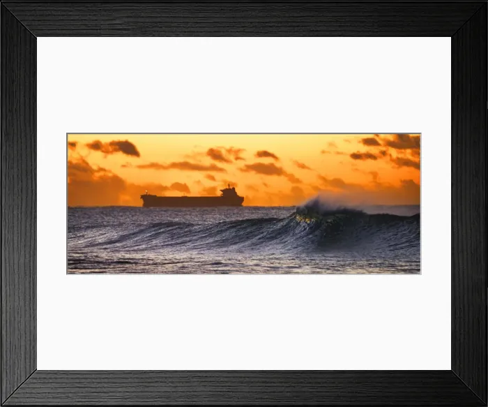Framed Print : coal ship entering port with wave in foreground Framed Print : coal ship entering port with wave in foreground