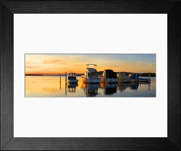 Framed Print : boast lined up at sunset in swansea