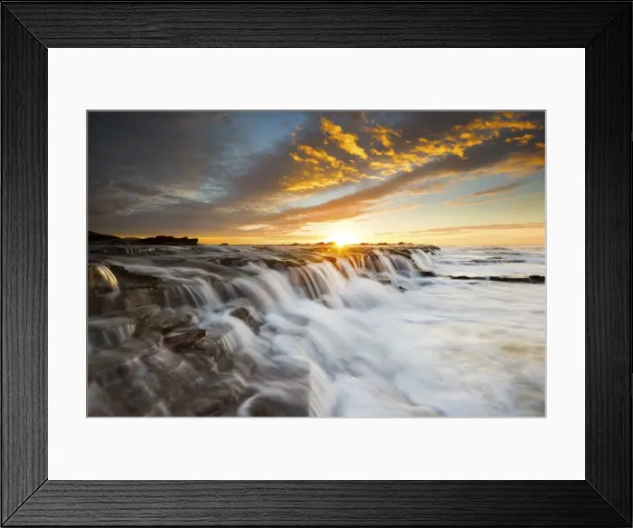 Framed Print : Seascape waterfall with sun star