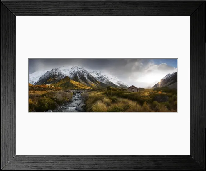 Framed Print : Synshine on snow covered mountains, creek & bridge