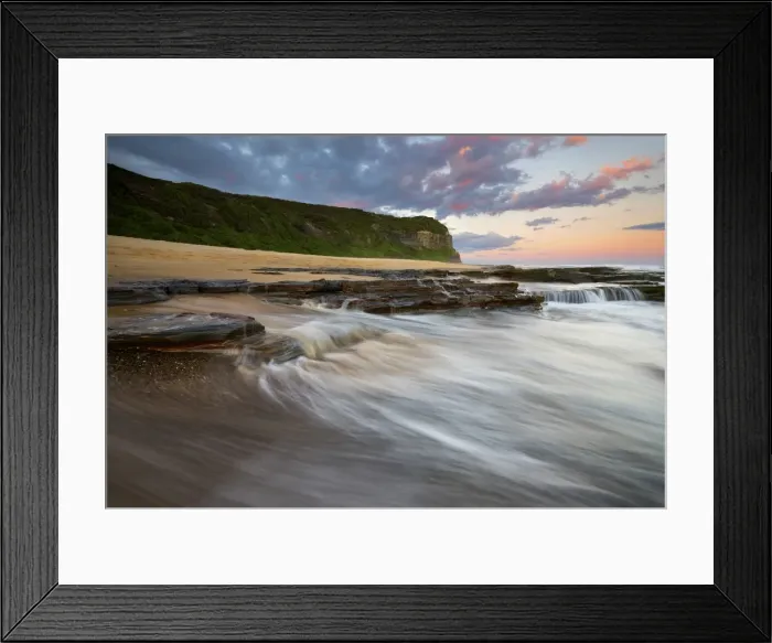 Framed Print : seascape with cliff in the background
