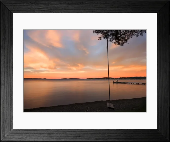 Framed Print : swing overlooking the lake at sunrise