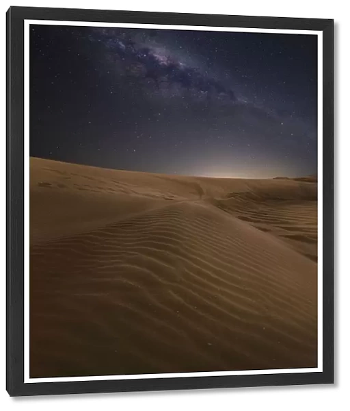 Sand dunes with stars and milkyway above
