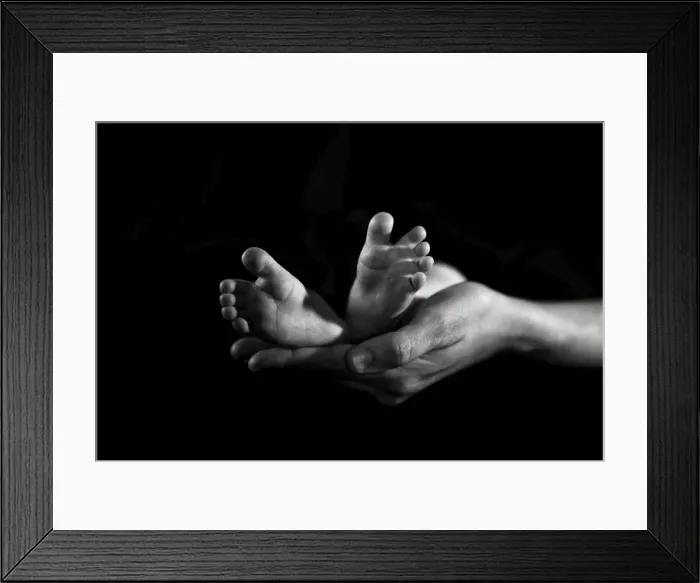 Framed Print : New born feet and mothers hands