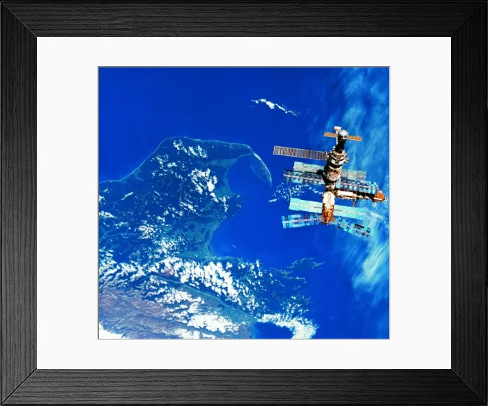 Framed Print : A space station orbiting above earth Framed Print : A space station orbiting above earth