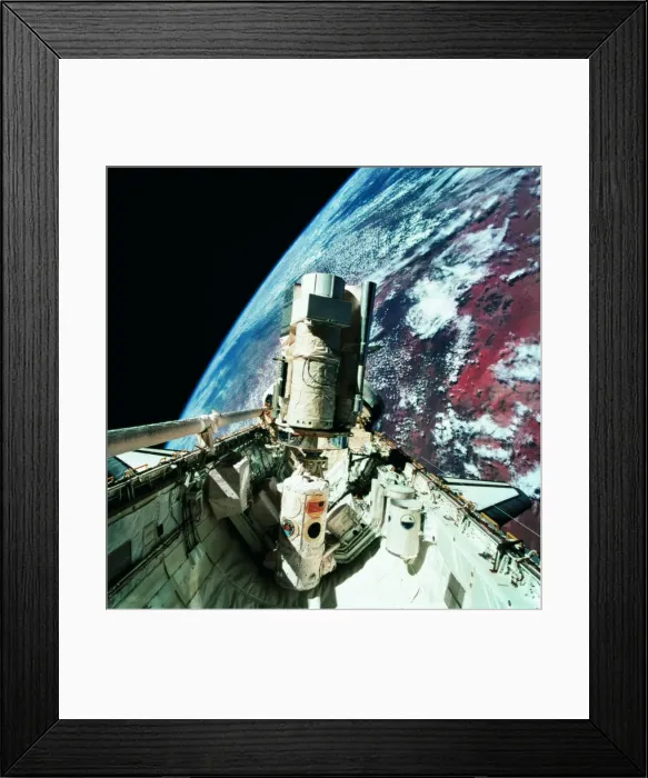 Framed Print : The open cargo bay of the space shuttle orbiting above earth Framed Print : The open cargo bay of the space shuttle orbiting above earth