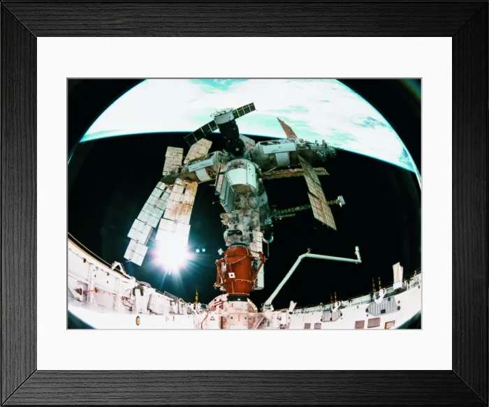 Framed Print : View from a wide angle lenses of a space station docking in orbit