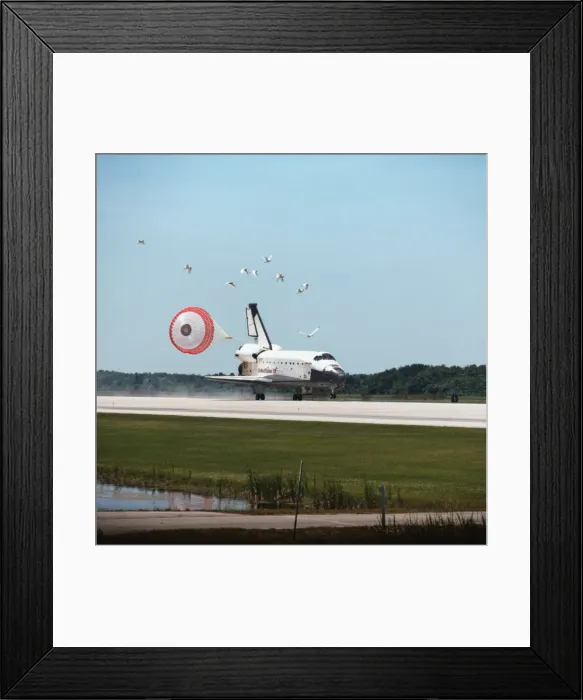 Framed Print : The space shuttle landing with its drogue parachute deployed Framed Print : The space shuttle landing with its drogue parachute deployed