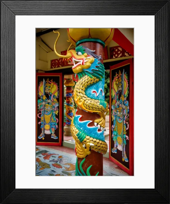 Framed Print : A Dragon Carving on a Pillar in Wat Hainan Temple Nathon, Ko Samui District, Surat Thani, Thailand