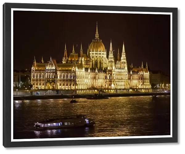 The Night Lights of The Hungarian Parliament Building Along River Danube, Budapest, Hungary