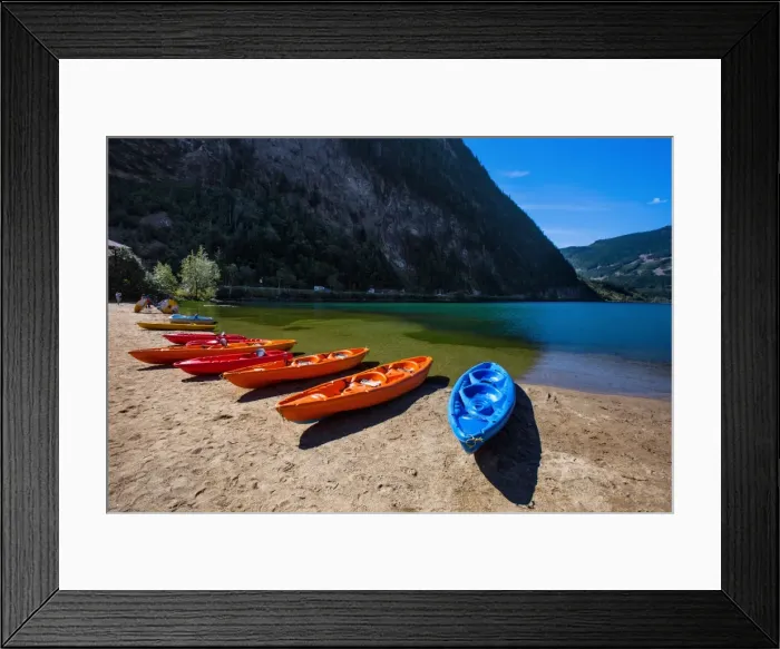 Framed Print : View of Three Valley Lake in Three Valley Gap with a Row of Canoes on the Trans-Canada Highway, British Columbia, Canada
