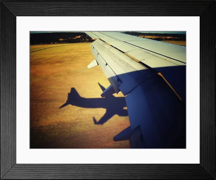 Framed Print : Landing. Commercial jet coming in to land at Melbourne airport, Australia Framed Print : Landing. Commercial jet coming in to land at Melbourne airport, Australia