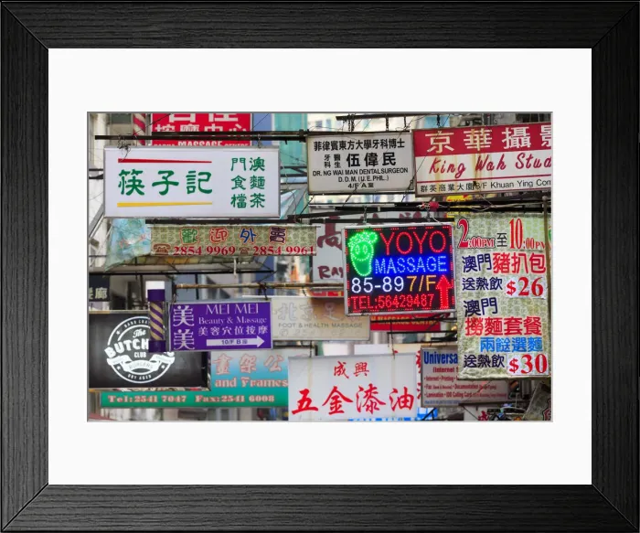 Framed Print : Hong Kong. Shop signs hanging over a central Hong Kong street Framed Print : Hong Kong. Shop signs hanging over a central Hong Kong street