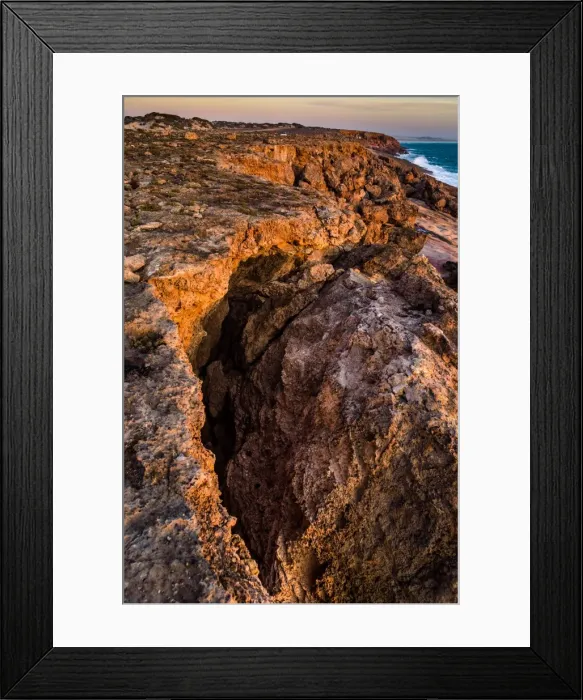 Framed Print : Talia Caves coastline
