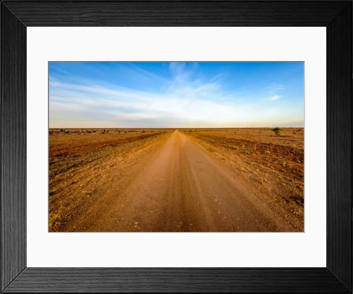 Framed Print : Dirt road crossing Mundi Mundi Plains in New South Wales