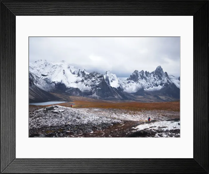Framed Print : Backpacker with tombstone mountain