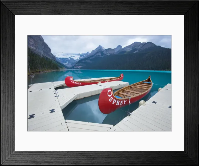 Framed Print : Lake louise with red Canoe