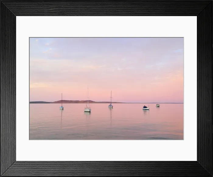 Framed Print : Boats moored in Boston Bay at sunset