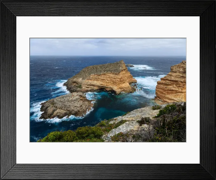 Framed Print : Sandstone outcrops off the coast at Cape Wiles Framed Print : Sandstone outcrops off the coast at Cape Wiles