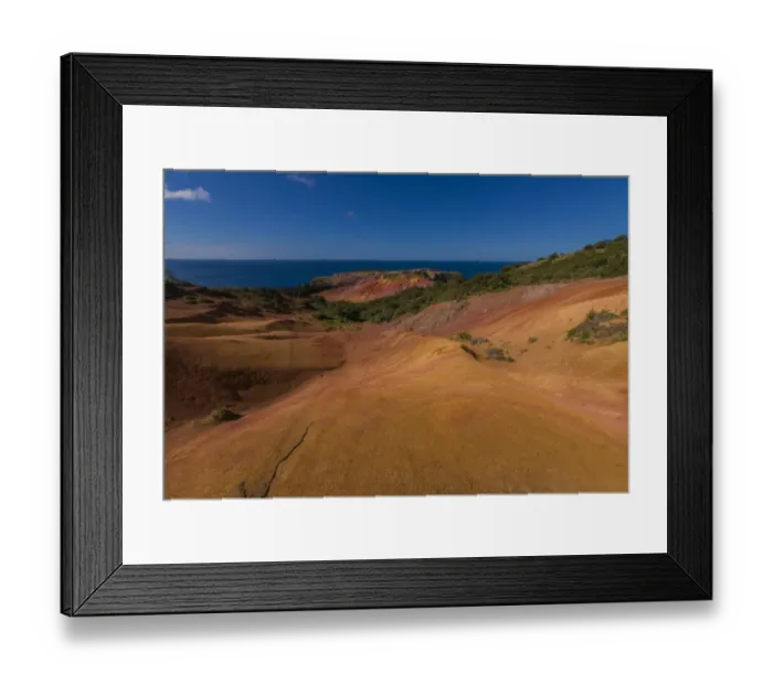 Framed Print : The rich red and ochre hues of the scarred landscape on Phillip island, situated just off Norfolk Island, south pacific ocean Framed Print : The rich red and ochre hues of the scarred landscape on Phillip island, situated just off Norfolk Island, south pacific ocean