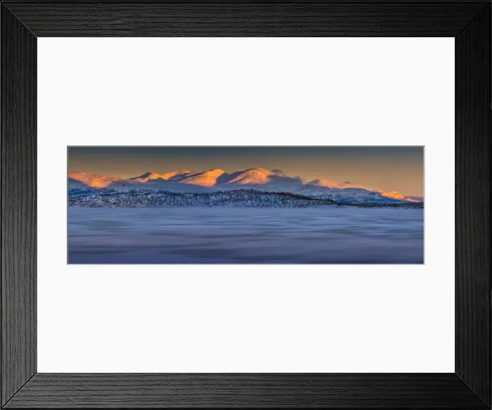 Framed Print : Dusk comes over a winter scene at Abisko National park in Lapland, Sweden