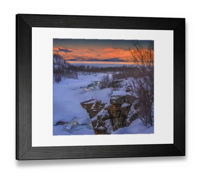 Framed Print : Dusk comes over a winter scene at Abisko National park in Lapland, Sweden