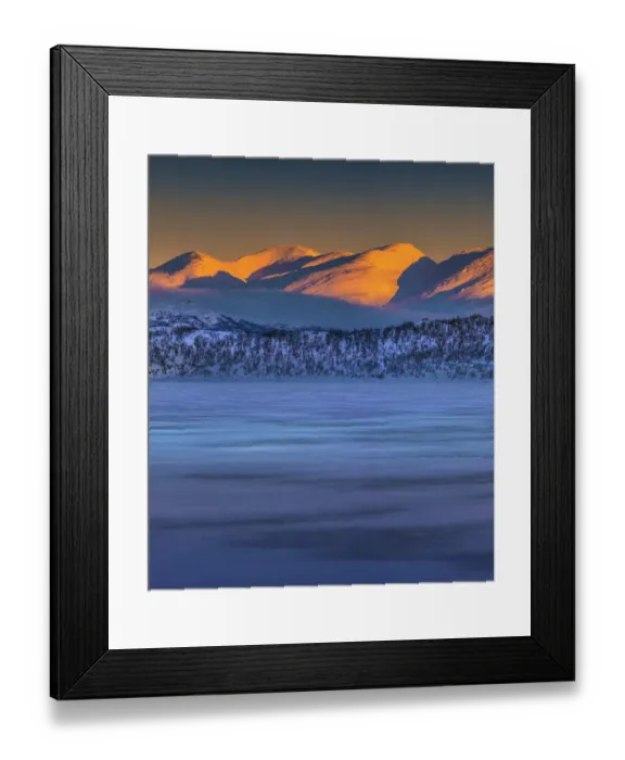 Framed Print : Dusk comes over a winter scene at Abisko National park in Lapland, Sweden