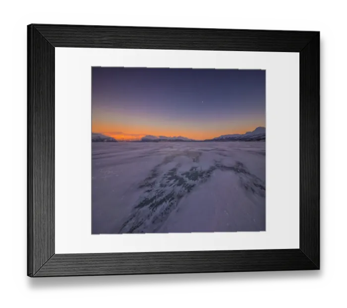 Framed Print : Dusk comes over a winter scene at Abisko National park in Lapland, Sweden