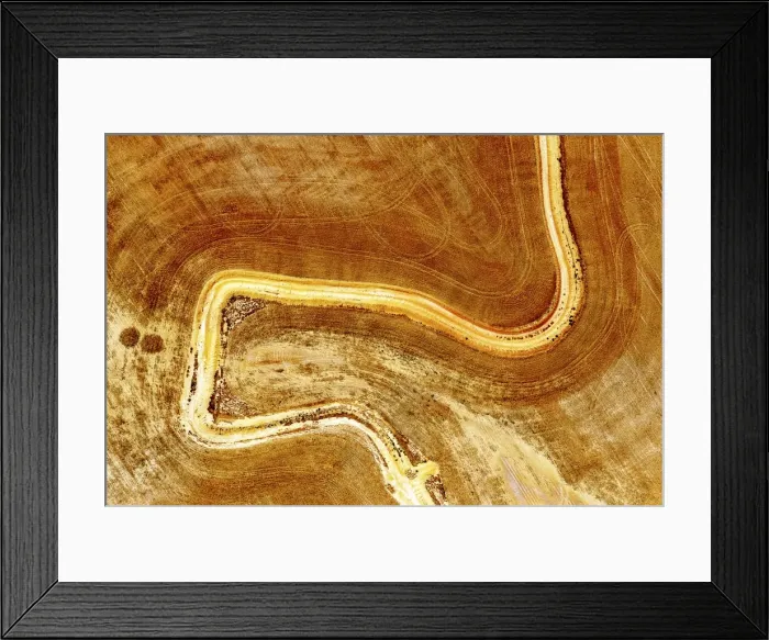 Framed Print : Aerial view of dirt road