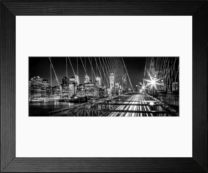 Framed Print : Brooklyn Bridge and Mahanttan skyline at night in black and white