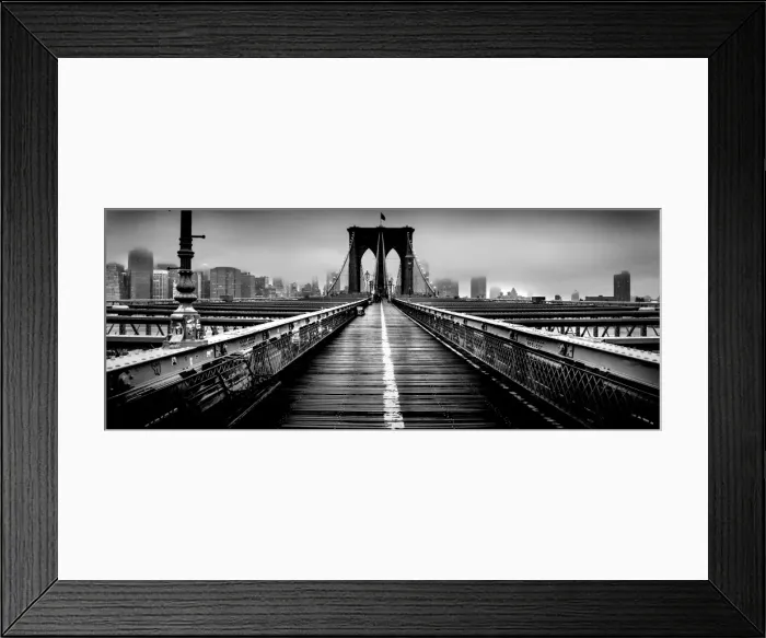 Framed Print : Brooklyn Bridge and Manhattan skyline under heavy fog in black and white