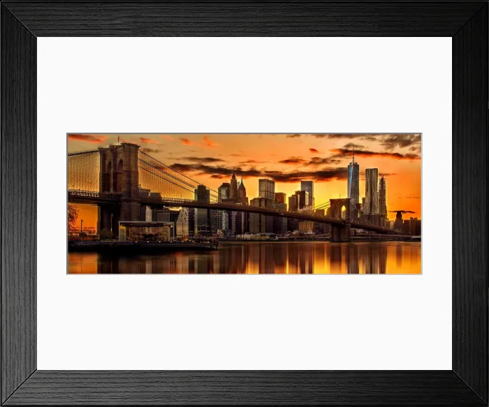Framed Print : A panorama view of a fiery sunset over the Manhattan skyline