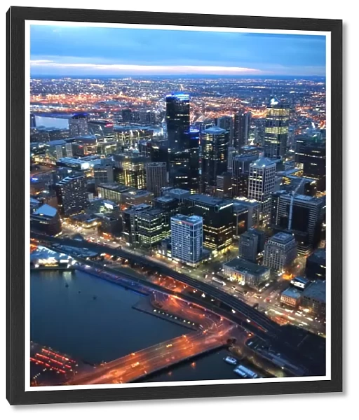 Melbourne City and Yarra river at cloudy dusk