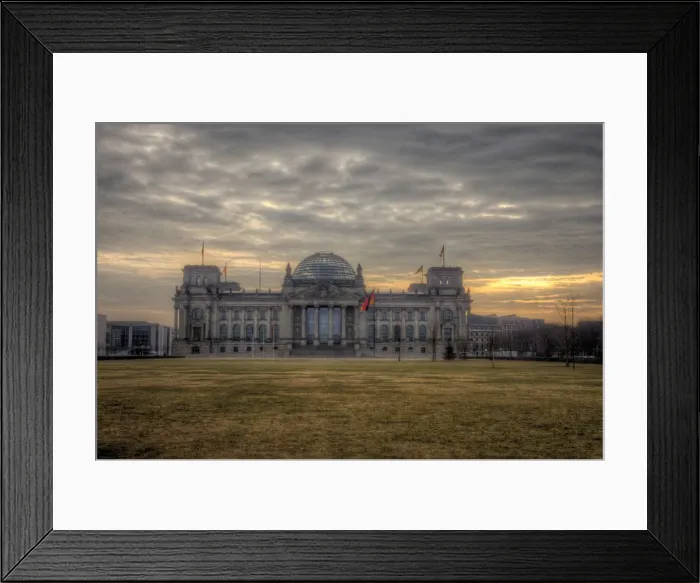 Framed Print : The Reichstag on cloudy sunrise light