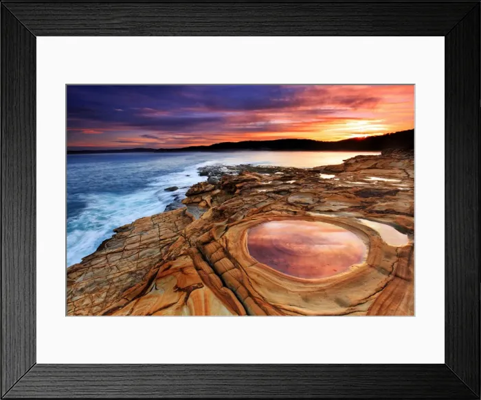 Framed Print : Sunset over rock formation and sea Framed Print : Sunset over rock formation and sea