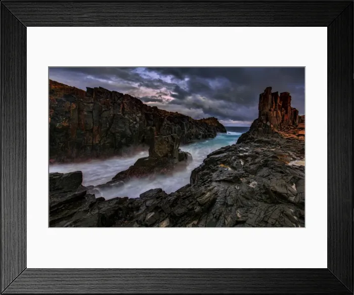 Framed Print : Dramatic rocky seascape sunset