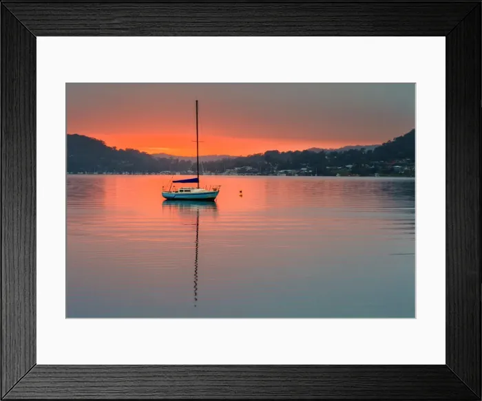 Framed Print : Yacht at sunrise