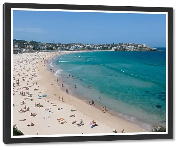 A view of Bondi beach and sunbathers on a bright sunny day