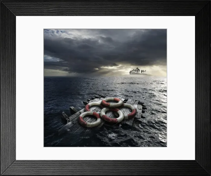 Framed Print : Survival. Life preservers adrift on a raft