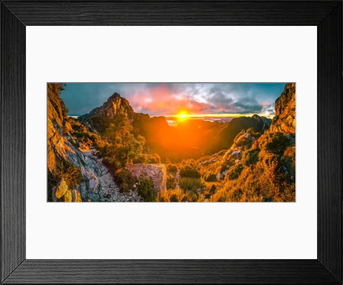 Framed Print : Sun rising up behind the Lions Head and Franklin River Basin on the way up to Fanchmens Cap (left and right rock walls)