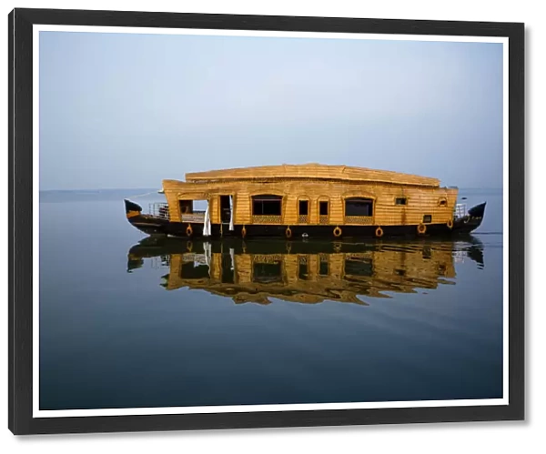 Houseboat Crusing By on Vembanadu Lake in the Misty Morning, Kumarakom, Kottayam, Kerala Backwaters, India
