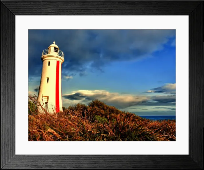 Framed Print : Lighthouse on the hill