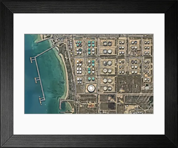 Framed Print : Oil reservoirs at industrial refinery