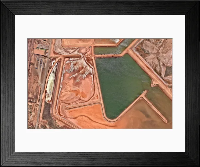 Framed Print : Iron ore facility with heavy machinery Framed Print : Iron ore facility with heavy machinery