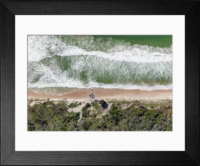 Framed Print : Desolate section of coast with nautical warning tower in foreground Framed Print : Desolate section of coast with nautical warning tower in foreground