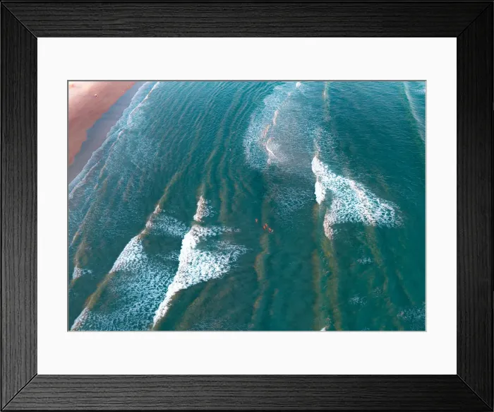 Framed Print : crystal clear waters with swimmers as seen from above Framed Print : crystal clear waters with swimmers as seen from above