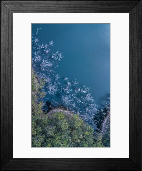 Framed Print : Hinze Dam. The Hinze Dam is a rock and earth-fill embankment dam with an